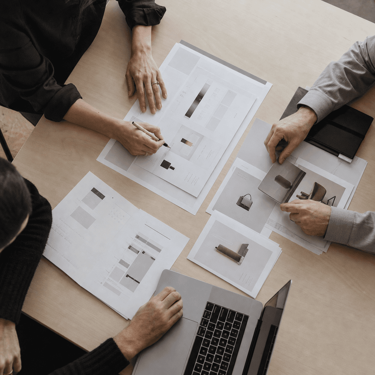 A team reviewing ecommerce layouts and product imagery together